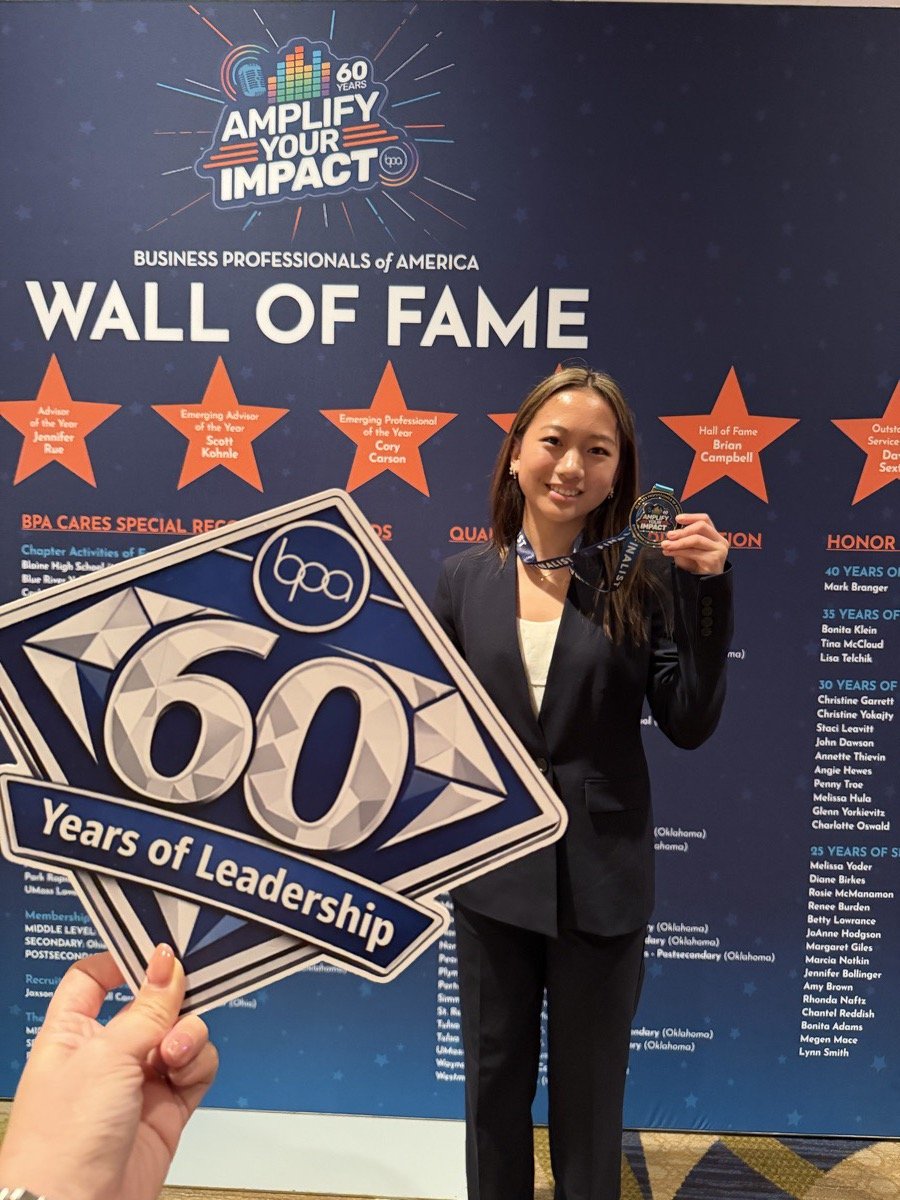 A Beyond Young student at the BPA Wall of Fame with her finalist medal